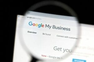 Magnifying Glass highlight Google My Business on a computer screen