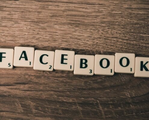 Scrabble pieces spelling the word Facebook