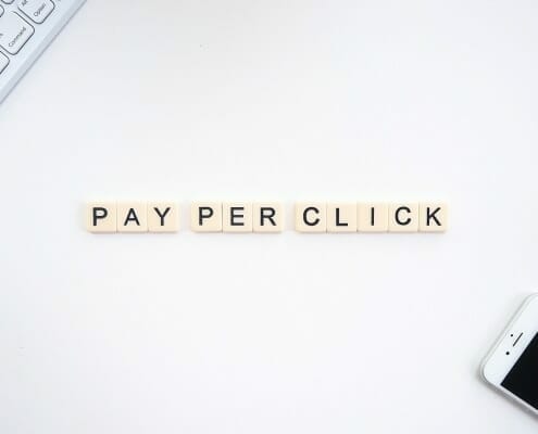Pay Per Click spelled out using Scrabble pieces