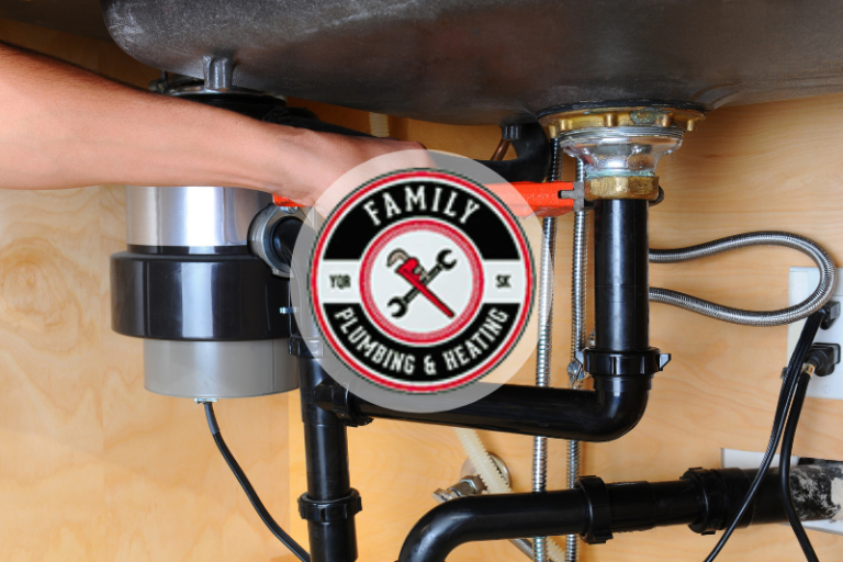 Family Plumbing and Heating featured image showing a person working under a sink.