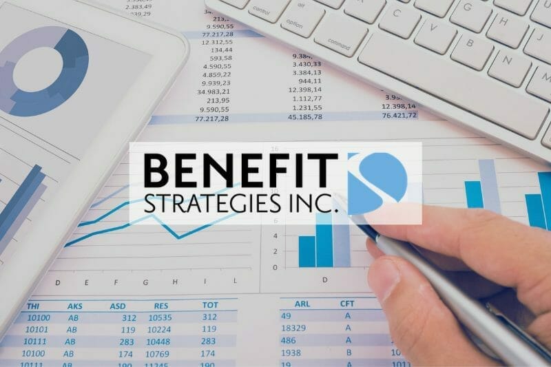 Benefit Strategies Inc. featured image showing data spreadsheets beside a computer keyboard.