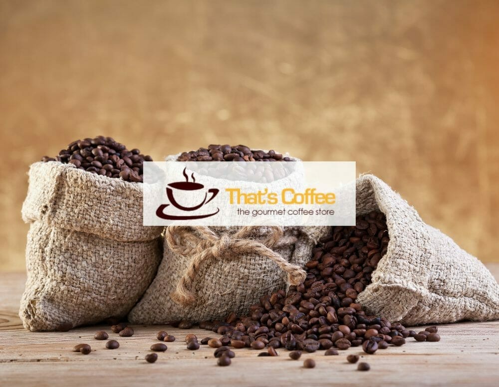 That's coffee Logo over image of 3 bags of whole bean coffee