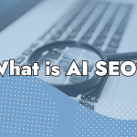 A magnifying glass on a laptop keyboard with large text overlaid that reads, "What is AI powered SEO?" Blue and white graphic shapes are at the bottom of the image.