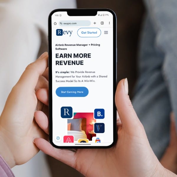 A person holding a smartphone displaying the Revyo app. The screen shows text about revenue management for Airbnb, including "Earn More Revenue" and a button labeled "Start Earning More." Various app icons are visible at the bottom.