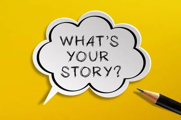 A speech bubble with the text "WHAT'S YOUR STORY?" is on a bright yellow background. A sharpened pencil points towards the bubble from the bottom right corner, suggesting a call to share or create a story.